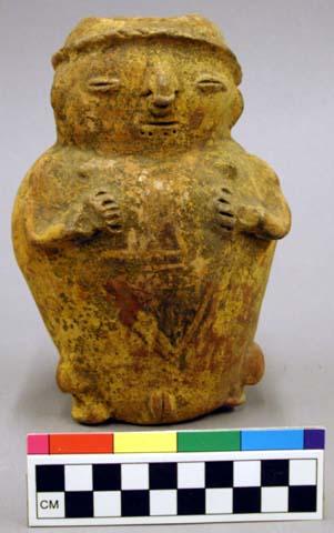 Ceramic effigy vessel, female human form, polychrome, hands crossing chest