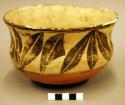 Polychrome pottery bowl - red, black, yellow
