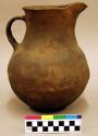 Brown pottery pitcher