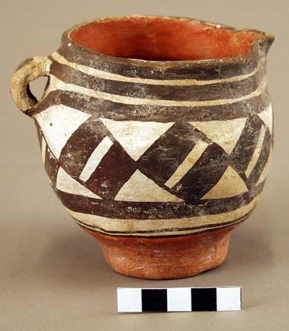 Small earthen pitcher