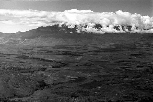 View towards the southwest; Tukumba and Homoak in lower left; mts. to the west