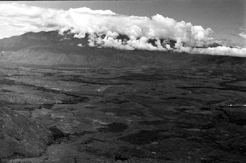 View towards the southwest; Tukumba and Homoak in lower left; mts. to the west