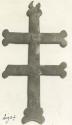 Artifact in shape of cross but with 2 horizontal lines from Ojibwa grave