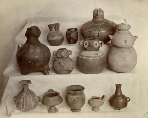 One dozen pottery vessels.