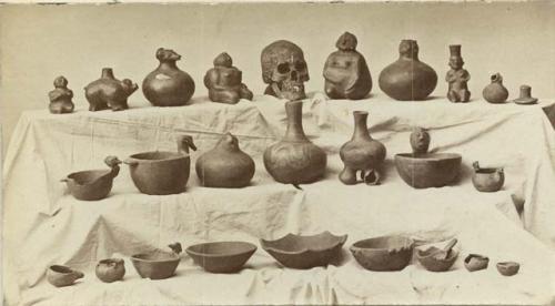 Collection of archeological finds, mostly pottery, bowls, vessels