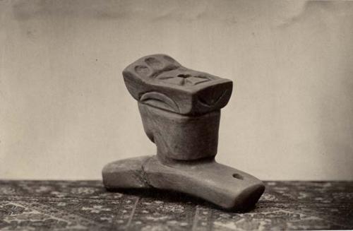 Effigy pipe, human head, back view.