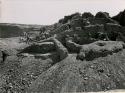 Men excavating outer southwest corner