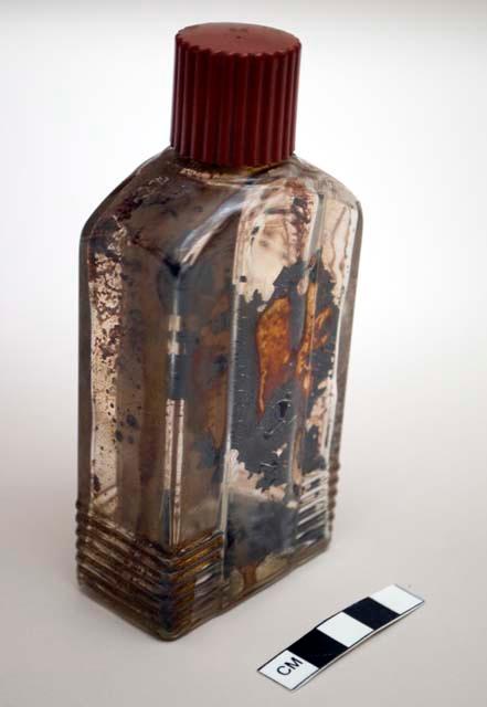 Bottle of red basketry dye