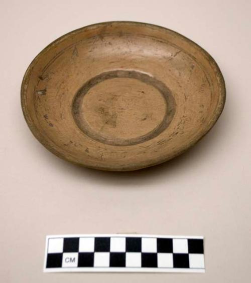 1 buff pottery dish