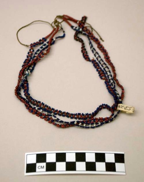 Small necklace of 3 strands of glass beads; red, white, and blue