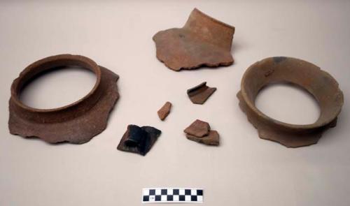 Ceramic rim & body sherds,  various vessels, red slip, 1 strap handle