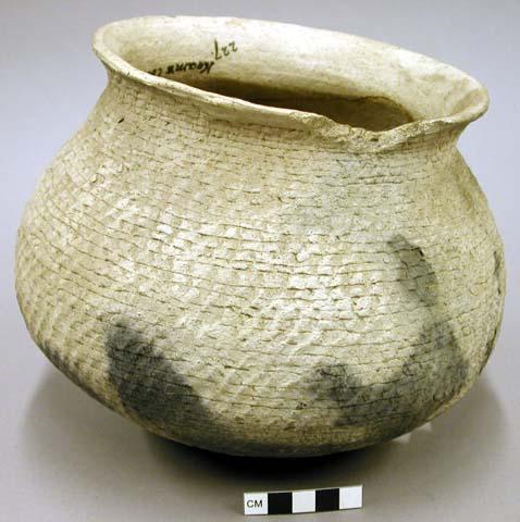 Corrugated pottery jar