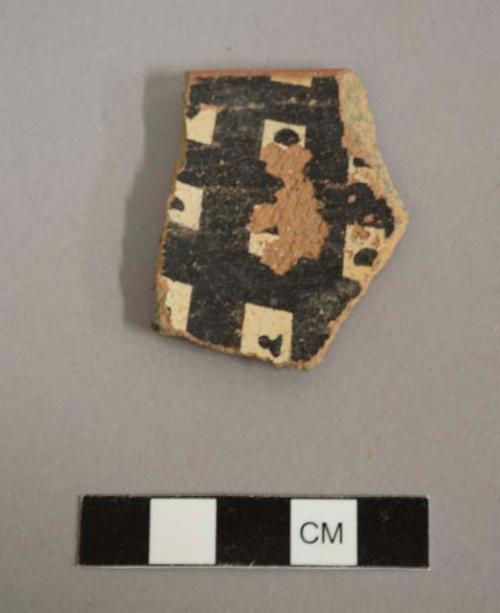 Rim sherd, interior black-on-white, exterior red slip. gila polychrome