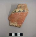 Ceramic rim sherd of a jar. Exterior has linear design of black and white on red, interior slipped red - tonto polychrome