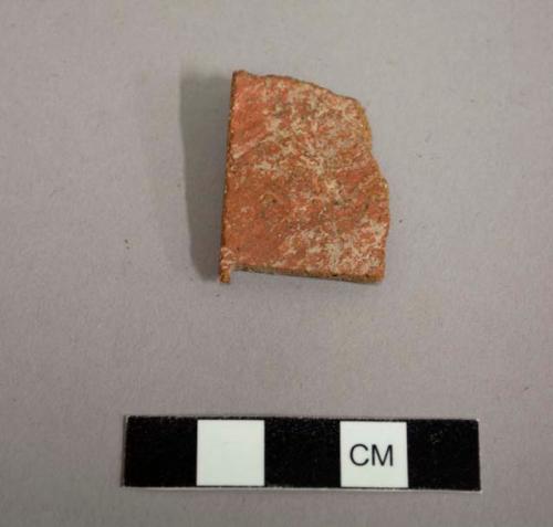 Ceramic body sherd of a jar. Exterior slipped red, interior plain - tonto polychrome