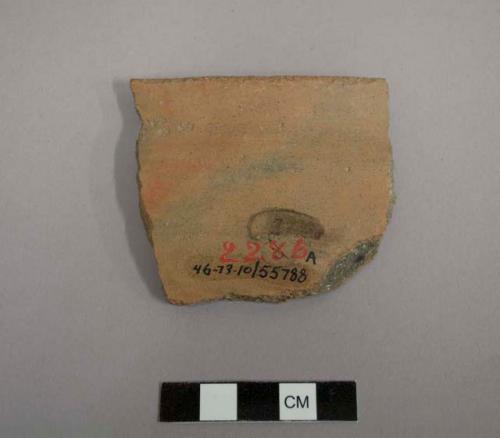 Rim sherd of bowl, exterior red slip, interior black-on-buff. gila polychrome