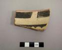 Rim sherd of bowl with slipped red exterior; interior black-on-white linear and geometric designs - gila polychrome