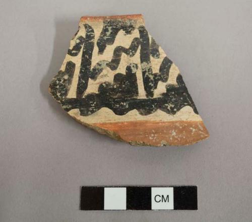 Rim sherd; jar; short neck, wide mouth, exterior band of black and white linear decoration with red below, red slip on interior, - gila polychrome