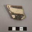 Ceramic rim sherd of a bowl, black on white linear and geometric designs on interior and exterior, red slip on rim - gila polychrome