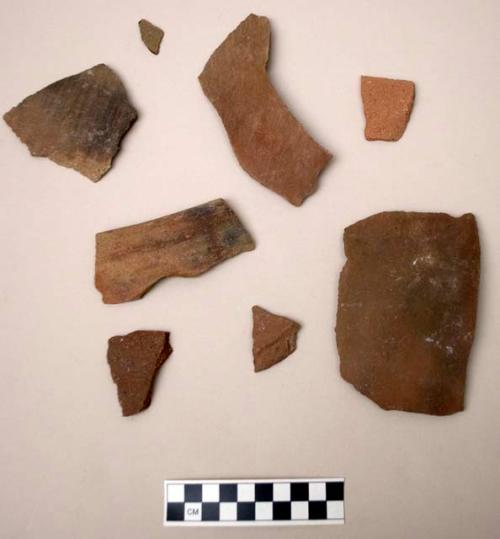 Ceramic body sherds, red slip, shell temper