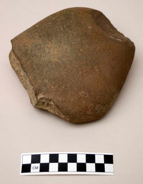 Stone metates, ovoid, 1 broken, 1 side abraided