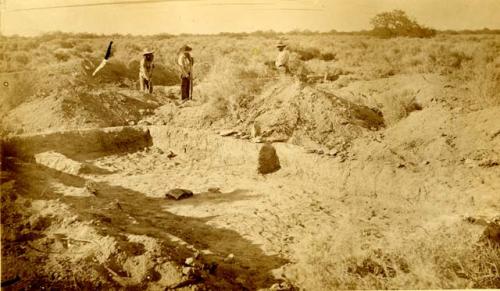 Looking NNE  Ruin III.  Appearance of an excavated room showing door, step, fire  bowl, and alcove in left corner