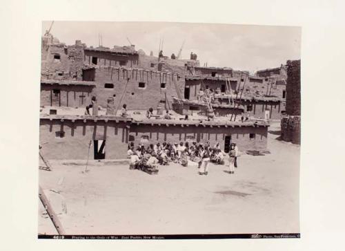 Zuni Indians praying to the Gods of  War