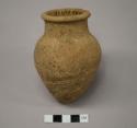 Small pointed bottom jar - plain brown ware (Class B)