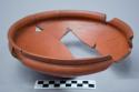 Restored fine red polished ware bowl - recurved rim (Class C)