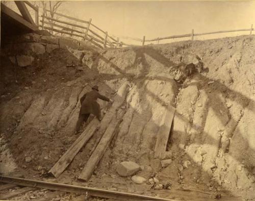 Under bridge, Darley's Road. Hand marks the place where paleolith was discovered.