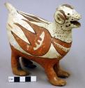 Ram effigy vessel, red and brown on white