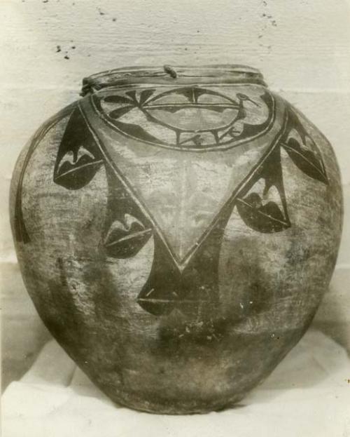 Painted pot with geometric designs