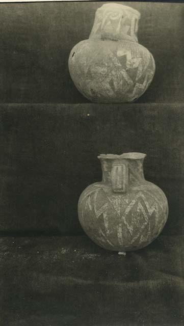 Black and white pitchers with geometric designs