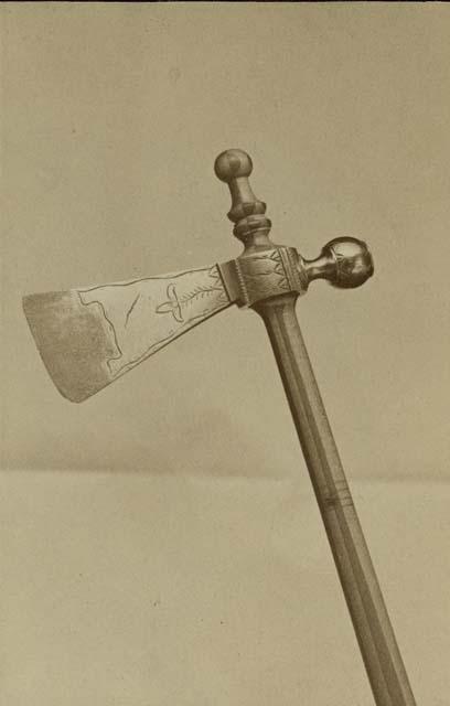 Brass tomahawk with steel cutting edge, pipe bowl with hole through handle