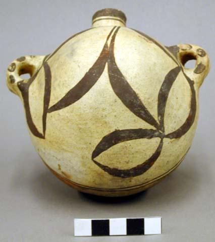 Polychrome pottery small canteen - red, black, white.