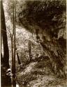 Fort Hill, path in woods beneath rocks.