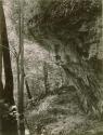 Fort Hill, path in woods beneath rocks.