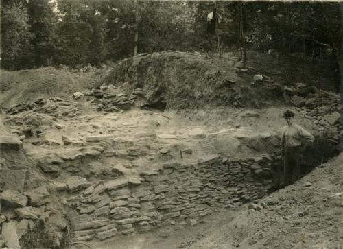 Cut through embankment showing wall.