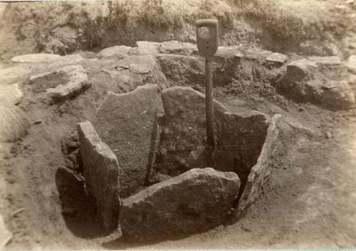 From stake II the south-west hexagonal cyst or grave 4. Human cremation and pipe