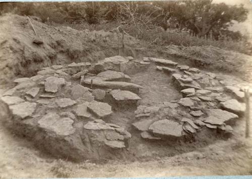 26. Suite 92 Hayner Stone Graves. view from west of grave IV in hexagonal cyst.