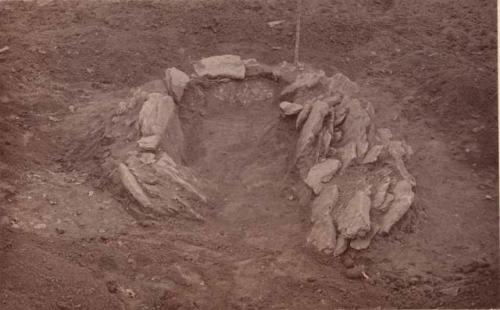 Third view of grave on hill.