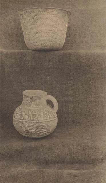 Coiled bowl, polished black interior and black and white pitcher