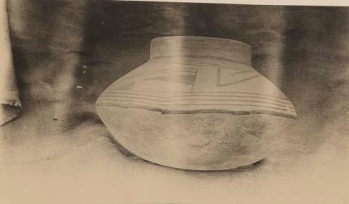 Large olla of biscuit ware. Locality not known, probably by Pajarito Park, NM