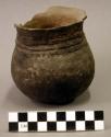 Ceramic jar, flared lip, corrugated neck, missing rim sherds