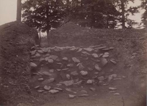 View no. 1 from the north showing through cut I to the level beyond, stone wall