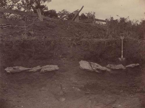 View from the northwest of four graves, the two marked by trowels having had stones removed. 

