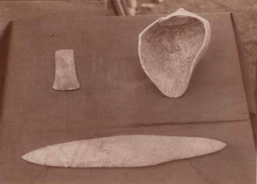 Copper celt form mound number 3. Shell from mound 20. Flint sword from Taylor's Mound.