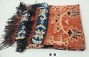 Man's shoulder or hip cloth, hinggi; indigo, red and tan with white, red and blue ikat designs of lizards, birds, plants?