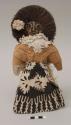 Doll; body and clothing of masi bark cloth; hair of coconut fiber; painted face