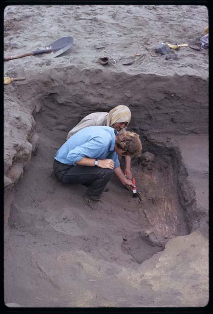 Section Cuy II, Huanchaco     Mechica burial of female, cut through adobe floor of room, 2 interrments in this burial but only in interrment #62 is shown in photographs I-3.